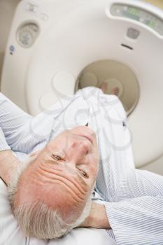 Royalty Free Photo of a Man About to Have a CAT Scan