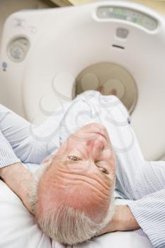 Royalty Free Photo of a Man About to Have a CAT Scan
