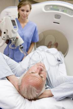 Royalty Free Photo of a Nurse About to Have a CAT Scan