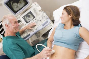 Royalty Free Photo of a Woman Having an Ultrasound