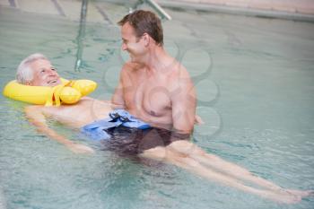 Royalty Free Photo of a Patient Undergoing Therapy in a Pool