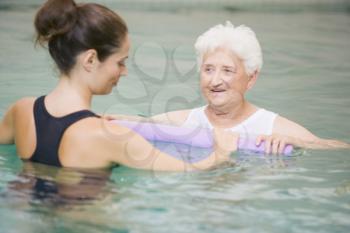 Royalty Free Photo of a Woman Having Therapy in a Pool