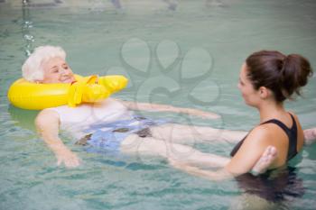 Royalty Free Photo of a Woman Having Therapy in a Pool