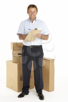 Royalty Free Photo of a Courier With a Lot of Parcels and a Clipboard
