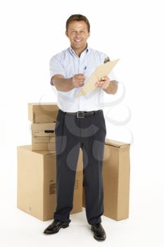 Royalty Free Photo of a Courier With Parcels and a Clipbard