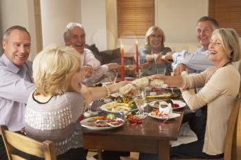 Royalty Free Photo of People Having a Christmas Dinner Party