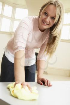 Royalty Free Photo of a Woman Doing Housework