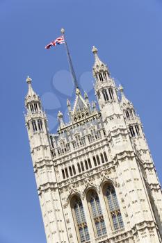 Royalty Free Photo of a Flag Flying on Westminster Abbey