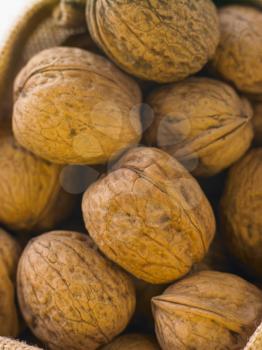 Royalty Free Photo of Walnuts in a Basket