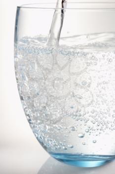 Royalty Free Photo of Water Being Poured in Glass