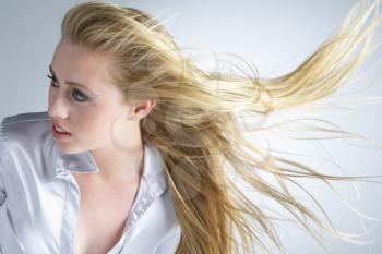 Royalty Free Photo of a Girl With Blowing Hair