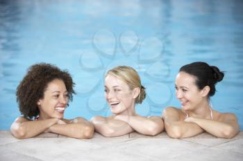 Royalty Free Photo of Three Friends in a Pool