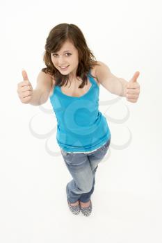 Royalty Free Photo of a Girl Giving Thumbs Up