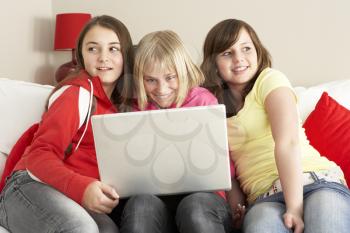 Royalty Free Photo of Girls Using a Laptop