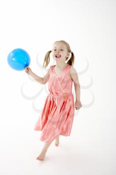 Royalty Free Photo of a Little Girl With a Balloon