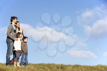 Royalty Free Photo of a Family Standing Outside