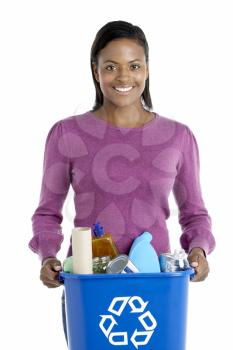 Royalty Free Photo of a Woman With a Recycling Bin