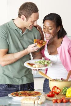Royalty Free Photo of a Couple Eating