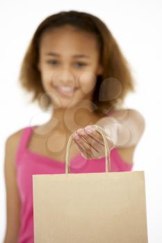 Royalty Free Photo of a Girl Holding a Shopping Bag