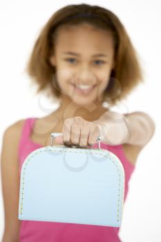 Royalty Free Photo of a Girl Holding a Little Suitcase