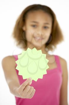 Royalty Free Photo of a Young Girl Holding a Sale Tag