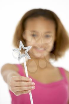 Royalty Free Photo of a Girl Holding a Star Wand