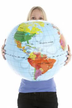 Royalty Free Photo of a Woman Holding a Globe