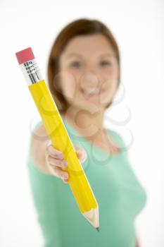 Royalty Free Photo of a Woman With a Big Pencil