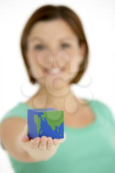 Royalty Free Photo of a Woman Holding a Cubed Globe