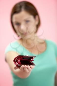 Royalty Free Photo of a Woman Holding an Empty Purse