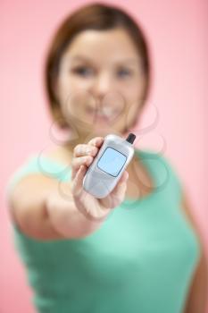 Royalty Free Photo of a Woman Holding a Cellphone