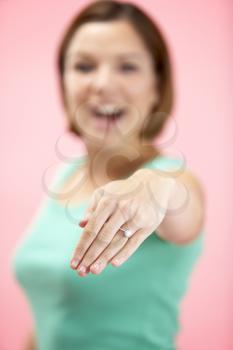 Royalty Free Photo of a Woman Wearing an Engagement Ring