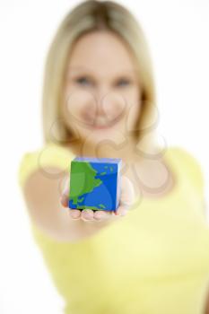 Royalty Free Photo of a Woman With a Cubed Globe