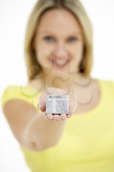 Royalty Free Photo of a Woman With a Small Gift