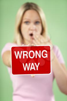 Royalty Free Photo of a Woman With a Wrong Way