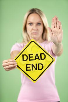 Royalty Free Photo of a Woman With a Dead End