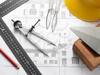 Royalty Free Photo of Building Equipment on House Plans