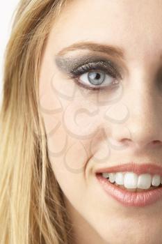 Royalty Free Photo of a Girl With Heavily Made Up Eyes