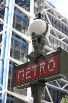 Royalty Free Photo of a Metro Sign in Paris France