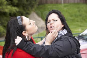 Royalty Free Photo of Two Women Fighting
