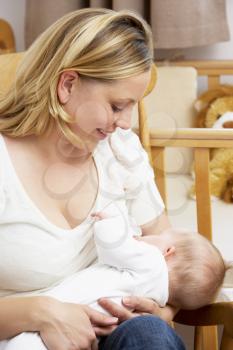 Royalty Free Photo of a Mother Breastfeeding