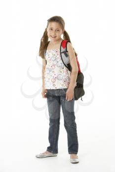 Studio Portrait of Girl Standing with backpack