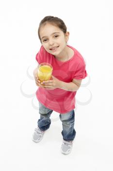 Royalty Free Photo of a Little Girl With a Glass of Juice