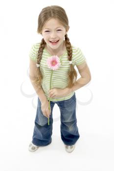 Royalty Free Photo of a Little Girl With a Daisy