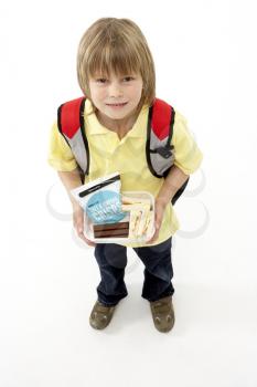Royalty Free Photo of a Little Schoolboy With a Backpack