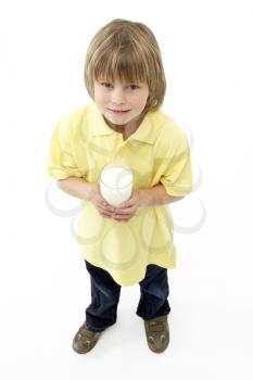 Royalty Free Photo of a Little Boy Holding a Glass of Milk