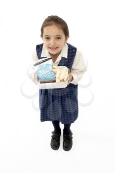 Royalty Free Photo of a Girl Holding a Lunchbox