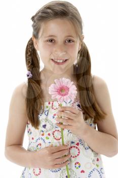 Royalty Free Photo of a Little Girl With a Flower