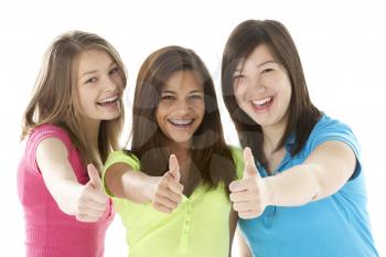 Royalty Free Photo of a Group of Teenage Girls Giving Thumbs Up