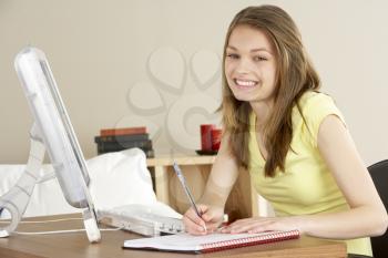 Royalty Free Photo of a Girl Doing Homework